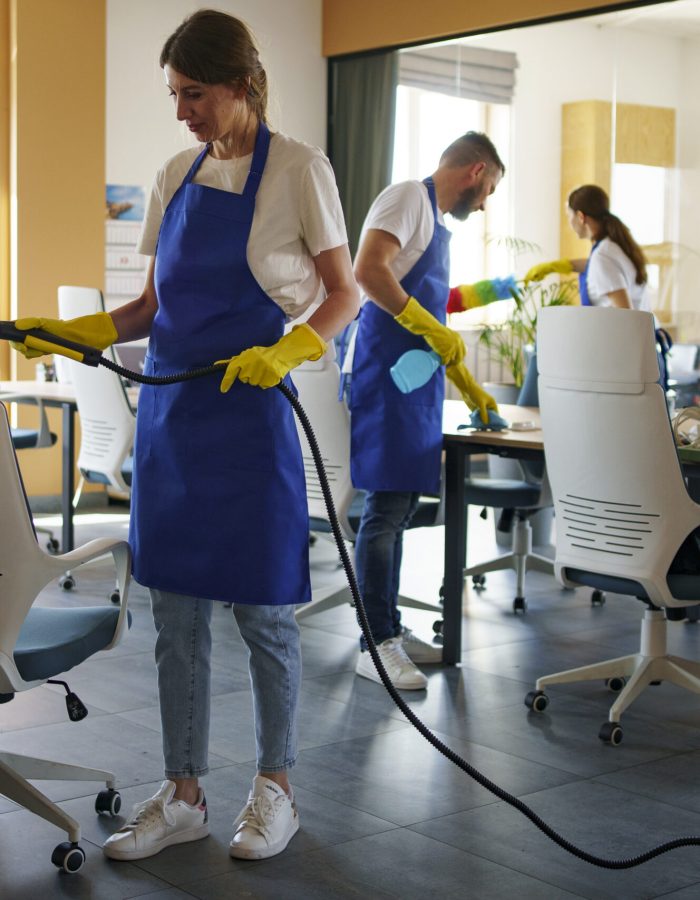 professional-cleaning-service-person-using-vacuum-cleaner-office (1)
